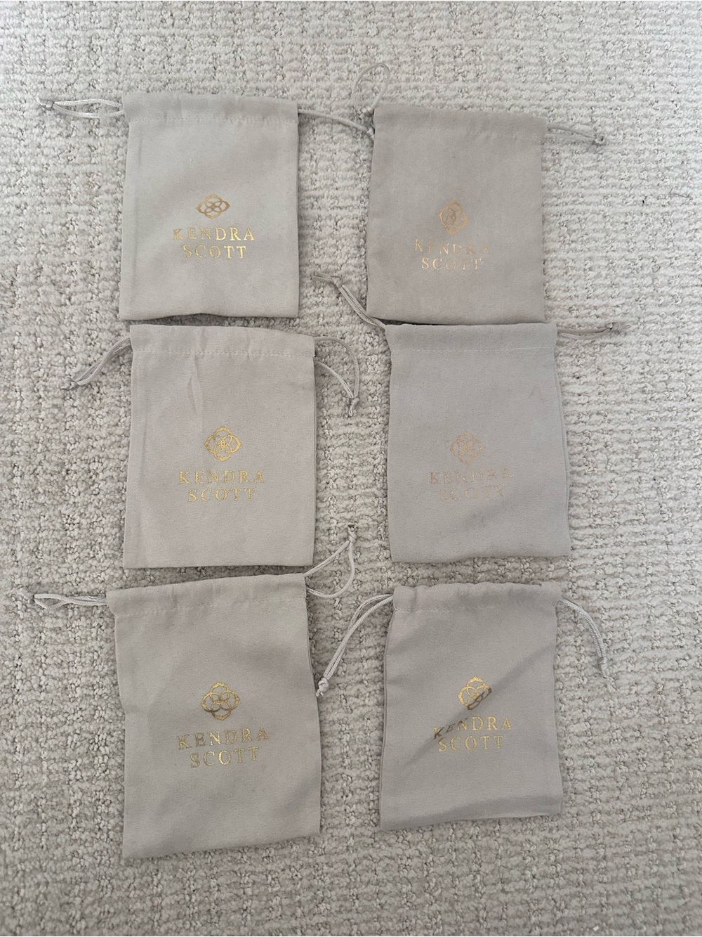 Kendra Scott Beige Drawstring Jewelry Pouches with Gold Logo (Set of 6)